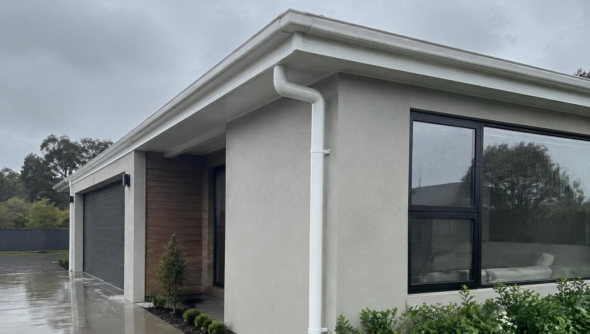 Residential property with professionally installed seamless rain gutters